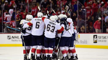 WASHINGTON, DC - OCTOBER 19: Jonathan Huberdeau #11 of the Florida Panthers celebrates with his teammates after scoring the game winning goal during a shootout against the Washington Capitals at Capital One Arena on October 19, 2018 in Washington, DC. The Panthers defeated the Capitals 6-5. (Photo by Patrick McDermott/NHLI via Getty Images)