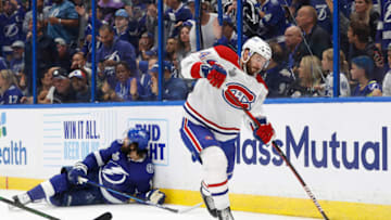 Jun 30, 2021; Tampa, Florida, USA; Montreal Canadiens defenseman Joel Edmundson (44) passes the puck against the Tampa Bay Lightning during the second period in game two of the 2021 Stanley Cup Final at Amalie Arena. Mandatory Credit: Kim Klement-USA TODAY Sports