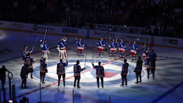 Oct 13, 2016; New York, NY, USA; The New York Rangers salute their fans before an opening night game against the New York Islanders at Madison Square Garden. Mandatory Credit: Brad Penner-USA TODAY Sports