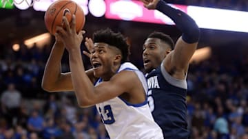 Dec 31, 2016; Omaha, NE, USA; Creighton Bluejays center Justin Patton (23) grabs a rebound against Villanova Wildcats forward Darryl Reynolds (45) at CenturyLink Center Omaha. Mandatory Credit: Steven Branscombe-USA TODAY Sports