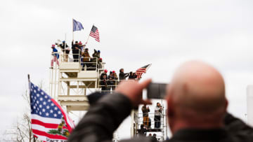 Protesters on grounds of the Capitol Building on January 6 (Photo by Jon Cherry/Getty Images)