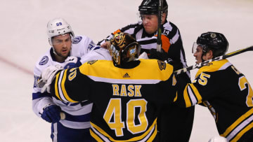 BOSTON - MARCH 29: Boston Bruins goalie Tuukka Rask goes after Lightning's Cory Conacher in the second period after he collided with Rask in the net. The Boston Bruins host the Tampa Bay Lightning in a regular season NHL hockey game at TD Garden in Boston on March 29, 2018. (Photo by John Tlumacki/The Boston Globe via Getty Images)