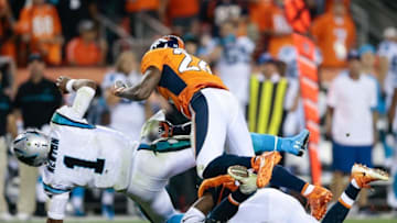 Sep 8, 2016; Denver, CO, USA; Carolina Panthers quarterback Cam Newton (1) is hit by Denver Broncos free safety Darian Stewart (26) in the fourth quarter at Sports Authority Field at Mile High. Mandatory Credit: Isaiah J. Downing-USA TODAY Sports