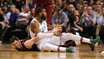 BOSTON, MA - MAY 15: Kevin Love #0 of the Cleveland Cavaliers and Greg Monroe #55 of the Boston Celtics battle for the ball in the first half during Game Two of the 2018 NBA Eastern Conference Finals at TD Garden on May 15, 2018 in Boston, Massachusetts. NOTE TO USER: User expressly acknowledges and agrees that, by downloading and or using this photograph, User is consenting to the terms and conditions of the Getty Images License Agreement. (Photo by Maddie Meyer/Getty Images)