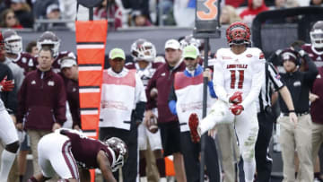 JACKSONVILLE, FL - DECEMBER 30: Dee Smith #11 of the Louisville Cardinals reacts after making a tackle for loss in the first half of the TaxSlayer Bowl against the Mississippi State Bulldogs at EverBank Field on December 30, 2017 in Jacksonville, Florida. (Photo by Joe Robbins/Getty Images)