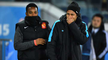 YOKOHAMA, JAPAN - DECEMBER 17:Robinho of Guangzhou Evergrande FC and Neymar of Barcelona share a joke before the FIFA Club World Cup Semi Final match between Barcelona and Guangzhou Evergrande FC at International Stadium Yokohama on December 17, 2015 in Yokohama, Japan. (Photo by Masterpress/Getty Images)