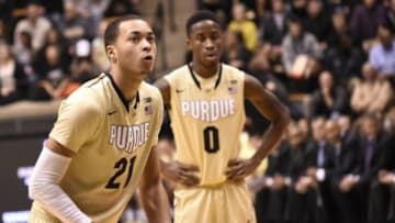 Nov 20, 2014; West Lafayette, IN, USA; Purdue Boilermakers guard Kendall Stephens (21) readies to shoot a free throw as guard Jon Octeus (0) watches in the first half against the Grambling State Tigers at Mackey Arena. Mandatory Credit: Sandra Dukes-USA TODAY Sports