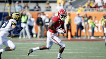 ORLANDO, FL - JANUARY 01: Jerry Jeudy #4 of the Alabama Crimson Tide runs after catching a pass during the Vrbo Citrus Bowl against the Michigan Wolverines at Camping World Stadium on January 1, 2020 in Orlando, Florida. Alabama defeated Michigan 35-16. (Photo by Joe Robbins/Getty Images)