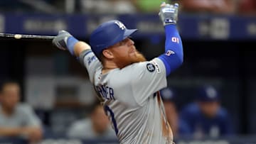 ST. PETERSBURG, FL - MAY 21: Justin Turner #10 of the Los Angeles Dodgers hits a fly ball in the seventh inning against the Tampa Bay Rays at Tropicana Field on May 21, 2019 in St. Petersburg, Florida. (Photo by Mike Carlson/Getty Images)