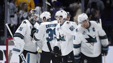 Apr 16, 2016; Los Angeles, CA, USA; San Jose Sharks goalie Martin Jones (31) celebrates with center Logan Couture (39) after their game in two of the first round of the 2016 Stanley Cup Playoffs against the Los Angeles Kings at Staples Center. The San Jose Sharks won 2-1. Mandatory Credit: Kelvin Kuo-USA TODAY Sports