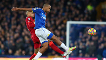 LIVERPOOL, ENGLAND - DECEMBER 01: Jose Salomon Rondon of Everton battles for possession with Fabinho of Liverpool during the Premier League match between Everton and Liverpool at Goodison Park on December 01, 2021 in Liverpool, England. (Photo by Alex Livesey/Getty Images)