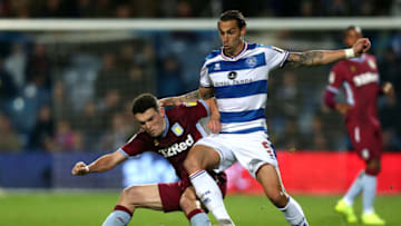 LONDON, ENGLAND - OCTOBER 26: Geoff Cameron of QPR is closed down by John McGinn of Aston Villa during the Sky Bet Championship match between Queens Park Rangers and Aston Villa at Loftus Road on October 26, 2018 in London, England. (Photo by Alex Pantling/Getty Images)