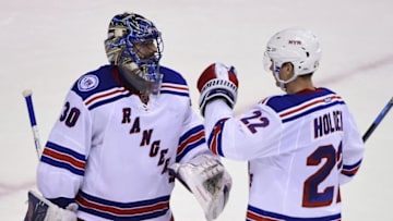 Nov 15, 2016; Vancouver, British Columbia, CAN; New York Rangers goaltender Antti Raanta (22) congratulates goaltender Henrik Lundqvist (30) for the win during the third period at Rogers Arena. The New York Rangers won 7-2. Mandatory Credit: Anne-Marie Sorvin-USA TODAY Sports