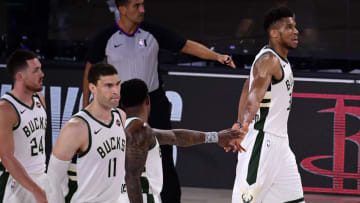 LAKE BUENA VISTA, FLORIDA - SEPTEMBER 06: Giannis Antetokounmpo #34 of the Milwaukee Bucks exits the game after an injury during the second quarter against the Miami Heat in Game Four of the Eastern Conference Second Round during the 2020 NBA Playoffs at AdventHealth Arena at the ESPN Wide World Of Sports Complex on September 06, 2020 in Lake Buena Vista, Florida. NOTE TO USER: User expressly acknowledges and agrees that, by downloading and or using this photograph, User is consenting to the terms and conditions of the Getty Images License Agreement. (Photo by Douglas P. DeFelice/Getty Images)