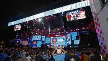 NASHVILLE, TENNESSEE - APRIL 25: Hometown fans of the Tennessee Titans react after their first round pick of Jeffery Simmons is announced on day 1 of the 2019 NFL Draft on April 25, 2019 in Nashville, Tennessee. (Photo by Frederick Breedon/Getty Images)