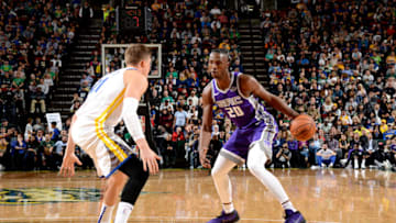 SEATTLE, WA - OCTOBER 5: Harry Giles #20 of the Sacramento Kings handles the ball against the Golden State Warriors during a pre-season game on October 5, 2018 at KeyArena in Seattle, Washington. NOTE TO USER: User expressly acknowledges and agrees that, by downloading and or using this photograph, user is consenting to the terms and conditions of Getty Images License Agreement. Mandatory Copyright Notice: Copyright 2018 NBAE (Photo by Noah Graham/NBAE via Getty Images)