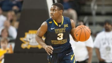 Dec 7, 2014; Highland Heights, KY, USA; West Virginia Mountaineers guard Juwan Staten (3) dribbles the ball during the second half at Bank of Kentucky Center. Mandatory Credit: Joshua Lindsey-USA TODAY Sports