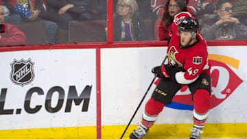 Dec 30, 2015; Ottawa, Ontario, CAN; Ottawa Senators defenseman Fredrik Claesson (49 skates with the puck in the third period against the New Jersey Devils at the Canadian Tire Centre. The Devils defeated the Senators 3-0. Mandatory Credit: Marc DesRosiers-USA TODAY Sports