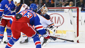 NEW YORK, NY - OCTOBER 13: New York Rangers Center Mika Zibanejad (93) scores a goal during the first period of the National Hockey League preseason game between the Edmonton Oilers and the New York Rangers on October 13, 2018 at Madison Square Garden in New York, NY. (Photo by Joshua Sarner/Icon Sportswire via Getty Images)