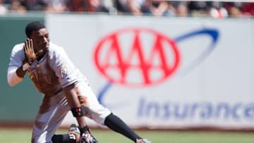 Apr 24, 2016; San Francisco, CA, USA; Miami Marlins second baseman Dee Gordon (9) gestures after stealing second base against the San Francisco Giants during the third inning at AT&T Park. Mandatory Credit: Kelley L Cox-USA TODAY Sports