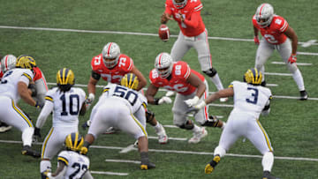 COLUMBUS, OH - NOVEMBER 24: Michael Jordan #73 of the Ohio State Buckeyes and Malcolm Pridgeon #66 of the Ohio State Buckeyes block against the Michigan Wolverines at Ohio Stadium on November 24, 2018 in Columbus, Ohio. Ohio State defeated Michigan 62-39. (Photo by Jamie Sabau/Getty Images)