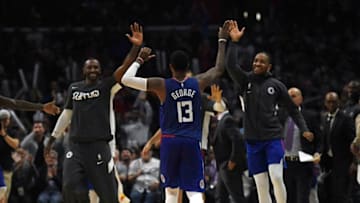 LOS ANGELES, CA - NOVEMBER 16: Paul George #13 of the Los Angeles Clippers is congratulated by his teammates as he comes out of the game during the second half the Atlanta Hawks during the second half at Staples Center on November 16, 2019 in Los Angeles, California. NOTE TO USER: User expressly acknowledges and agrees that, by downloading and/or using this Photograph, user is consenting to the terms and conditions of the Getty Images License Agreement (Photo by Kevork Djansezian/Getty Images)