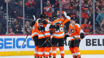 PHILADELPHIA, PA - APRIL 29: Owen Tippett #74, Ivan Provorov #9, Joel Farabee #86, and Scott Laughton #21 of the Philadelphia Flyers react against the Ottawa Senators at the Wells Fargo Center on April 29, 2022 in Philadelphia, Pennsylvania. (Photo by Mitchell Leff/Getty Images)