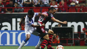 TIJUANA, MEXICO - SEPTEMBER 22: Pablo Lopez (L) of Pachuca fights for the ball with Omar Mendoza (R) of Tijuana during the 10th round match between Tijuana and Pachuca as part of the Torneo Apertura 2018 Liga MX at Caliente Stadium on September 22, 2018 in Tijuana, Mexico. (Photo by Gonzalo Gonzalez/Jam Media/Getty Images)