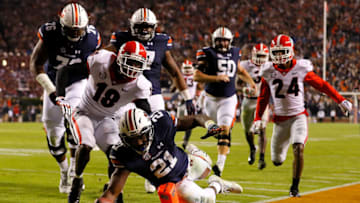 AUBURN, AL - NOVEMBER 11: Kerryon Johnson #21 of the Auburn Tigers dives for a touchdown past Deandre Baker #18 of the Georgia Bulldogs at Jordan Hare Stadium on November 11, 2017 in Auburn, Alabama. (Photo by Kevin C. Cox/Getty Images)