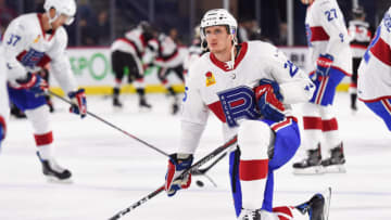 LAVAL, QC - DECEMBER 12: Laval Rocket center Michael McCarron (25) kneels on the ice at warm-up before the Belleville Senators versus the Montreal Canadiens game on December 12, 2018, at Place Bell in Laval, QC (Photo by David Kirouac/Icon Sportswire via Getty Images)