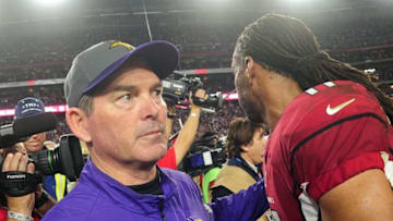 Dec 10, 2015; Glendale, AZ, USA; Minnesota Vikings head coach Mike Zimmer and Arizona Cardinals wide receiver Larry Fitzgerald (11) talk after the game at University of Phoenix Stadium. Mandatory Credit: Matt Kartozian-USA TODAY Sports