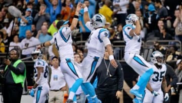 Dec 6, 2015; New Orleans, LA, USA; Carolina Panthers quarterback Cam Newton (1) celebrates with quarterback Derek Anderson (3) after scoring a touchdown during the second quarter against the New Orleans Saints at Mercedes-Benz Superdome. Mandatory Credit: Derick E. Hingle-USA TODAY Sports