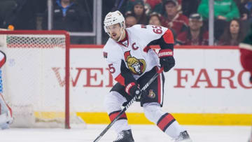 Mar 31, 2016; Saint Paul, MN, USA; Ottawa Senators defenseman Erik Karlsson (65) skates with the puck in the first period against the Minnesota Wild at Xcel Energy Center. the Ottawa Senators beat the Minnesota Wild 3-2. Mandatory Credit: Brad Rempel-USA TODAY Sports
