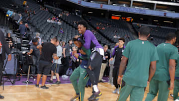 SACRAMENTO, CA - OCTOBER 11: De'Aaron Fox #5 of the Sacramento Kings jokes with Donovan Mitchell #45 of the Utah Jazz prior to the game on October 11, 2018 at Golden 1 Center in Sacramento, California. NOTE TO USER: User expressly acknowledges and agrees that, by downloading and or using this photograph, User is consenting to the terms and conditions of the Getty Images Agreement. Mandatory Copyright Notice: Copyright 2018 NBAE (Photo by Rocky Widner/NBAE via Getty Images)