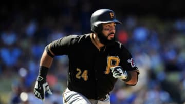 September 20, 2015; Los Angeles, CA, USA; Pittsburgh Pirates first baseman Pedro Alvarez (24) runs after he hits a single in the sixth inning against the Los Angeles Dodgers at Dodger Stadium. Mandatory Credit: Gary A. Vasquez-USA TODAY Sports