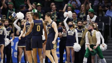 Mar 16, 2022; Dayton, Ohio, USA; Notre Dame Fighting Irish forward Paul Atkinson Jr. (20) guard Blake Wesley (0) and guard Cormac Ryan (5) react to a play in the second half against the Rutgers Scarlet Knights at University of Dayton Arena. Mandatory Credit: Rick Osentoski-USA TODAY Sports