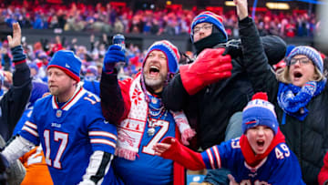 ORCHARD PARK, NY - NOVEMBER 24: Buffalo Bills fans celebrate a review resulting in a touchdown for the Buffalo Bills during the fourth quarter against the Denver Broncos at New Era Field on November 24, 2019 in Orchard Park, New York. Buffalo defeats Denver 20-3. (Photo by Brett Carlsen/Getty Images)