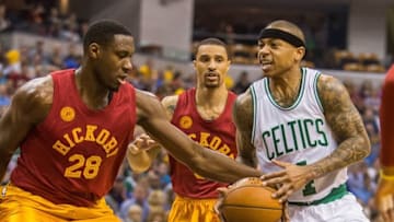 Mar 15, 2016; Indianapolis, IN, USA; Indiana Pacers center Ian Mahinmi (28) strips the ball from Boston Celtics guard Isaiah Thomas (4) in the first quarter of the game at Bankers Life Fieldhouse. Mandatory Credit: Trevor Ruszkowski-USA TODAY Sports