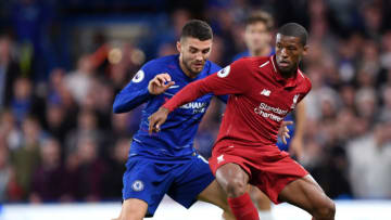 LONDON, ENGLAND - SEPTEMBER 29: Mateo Kovacic of Chelsea competes for the ball with Georginio Wijnaldum of Liverpool during the Premier League match between Chelsea FC and Liverpool FC at Stamford Bridge on September 29, 2018 in London, United Kingdom. (Photo by Shaun Botterill/Getty Images)