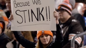 Nov 30, 2015; Cleveland, OH, USA; A Cleveland Browns fan holds a sign about Cleveland Browns quarterback Johnny Manziel (not pictured) against the Baltimore Ravens at FirstEnergy Stadium. Mandatory Credit: Ken Blaze-USA TODAY Sports