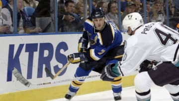 ST. LOUIS - NOVEMBER 4: Center Vaclav Prospal #40 of the Mighty Ducks of Anaheim pressures left wing Keith Thachuk #7 of the St. Louis Blues during the game at the Savvis Center on November 4, 2003 in St. Louis, Missouri. The Blues defeated the Mighty Ducks 2-1 in overtime. (Photo by Elsa/Getty Images)
