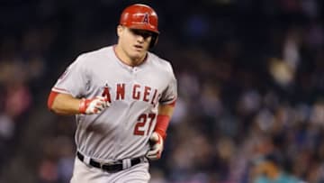 Sep 26, 2014; Seattle, WA, USA; Los Angeles Angels center fielder Mike Trout (27) rounds the bases after hitting a solo home run against the Seattle Mariners during the sixth inning at Safeco Field. Mandatory Credit: Steven Bisig-USA TODAY Sports