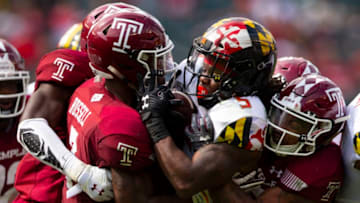 PHILADELPHIA, PA - SEPTEMBER 14: Chapelle Russell #3 and Shaun Bradley #5 of the Temple Owls tackle Anthony McFarland Jr. #5 of the Maryland Terrapins in the third quarter at Lincoln Financial Field on September 14, 2019 in Philadelphia, Pennsylvania. The Temple Owls defeated the Maryland Terrapins 20-17. (Photo by Mitchell Leff/Getty Images)