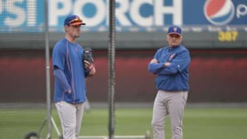 Oct 26, 2015; Kansas City, MO, USA; New York Mets manager Terry Collins (10) and shortstop Matt Reynolds (56) during workouts the day before game one of the 2015 World Series against the Kansas City Royals at Kauffman Stadium. Mandatory Credit: Denny Medley-USA TODAY Sports