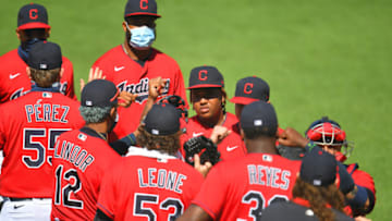 CLEVELAND, OHIO - JULY 26: Francisco Lindor #12 and Jose Ramirez #11 of the Cleveland Indians celebrate with teammates after the Indians defeated the Kansas City Royals at Progressive Field on July 26, 2020 in Cleveland, Ohio. The Indians defeated the Royals 9-2. The 2020 season had been postponed since March due to the COVID-19 pandemic. (Photo by Jason Miller/Getty Images)