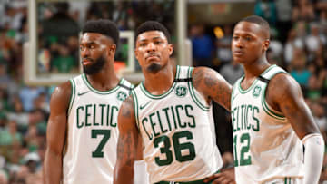 BOSTON, MA - MAY 15: Jaylen Brown #7, Marcus Smart #36, and Terry Rozier #12 of the Boston Celtics looks on during the game against the Cleveland Cavaliers during Game Two of the Eastern Conference Finals of the 2018 NBA Playoffs on May 15, 2018 at the TD Garden in Boston, Massachusetts. NOTE TO USER: User expressly acknowledges and agrees that, by downloading and or using this photograph, User is consenting to the terms and conditions of the Getty Images License Agreement. Mandatory Copyright Notice: Copyright 2018 NBAE (Photo by Jesse D. Garrabrant/NBAE via Getty Images)