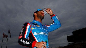 BROOKLYN, MI - JUNE 16: Darrell Wallace Jr., driver of the #43 Smithfield Ford, walks down pit lane during qualifying for the Monster Energy NASCAR Cup Series FireKeepers Casino 400 at Michigan International Speedway on June 16, 2017 in Brooklyn, Michigan. (Photo by Jonathan Ferrey/Getty Images)