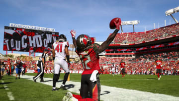 TAMPA, FL - DECEMBER 30: Wide receiver Chris Godwin #12 of the Tampa Bay Buccaneers celebrates his touchdown in the second quarter of the game against the Atlanta Falcons at Raymond James Stadium on December 30, 2018 in Tampa, Florida. (Photo by Will Vragovic/Getty Images)