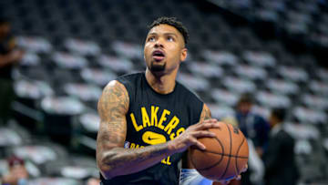Dec 15, 2021; Dallas, Texas, USA; Los Angeles Lakers forward Kent Bazemore (9) warms up before the game against the Dallas Mavericks at the American Airlines Center. Mandatory Credit: Jerome Miron-USA TODAY Sports