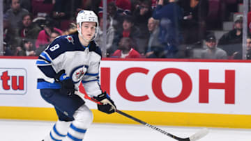 MONTREAL, QC - JANUARY 06: Sami Niku #8 of the Winnipeg Jets skates against the Montreal Canadiens during the second period at the Bell Centre on January 6, 2020 in Montreal, Canada. The Winnipeg Jets defeated the Montreal Canadiens 3-2. (Photo by Minas Panagiotakis/Getty Images)